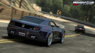 Rear view of a blue Chevrolet Camaro Concept racing in Los Angeles.