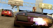 A Lamborghini Murcielago racing on the freeway in in-game Los Angeles.
