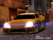 A yellow Saikou XS in a Tokyo alley.