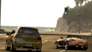 A 2008 Volkswagen Golf and a Nissan 350Z race near the beach in Los Angeles.