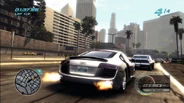 An Audi R8 racing near Downtown Los Angeles in the afternoon.
