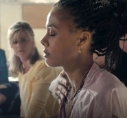 Noah's hand on Hannah during Yoga