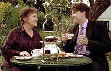 Mrs. Cook feeding Troy