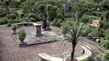Jane Bennett standing in the Memorial Garden