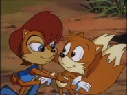 Satam Sally and Tails give him a funny kiss