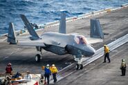 A F-35C of the United States Navy on a aircraft carrier deck