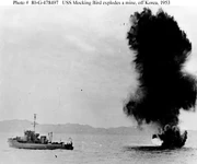 USS Mockingbird destroying an enemy mine