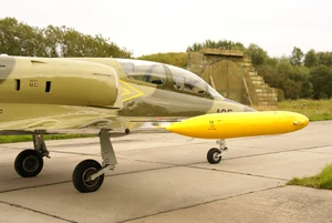 L-39 in front of a shelter