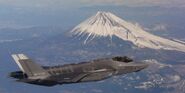 A F-35A of the JASDF flying beside Mount Fuji