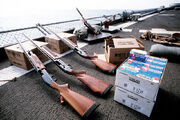 A  , two    shotguns, 20 boxes of , a clay trap, and three boxes of .