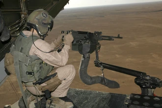 An M240 mounted on the cargo ramp of a V-22.