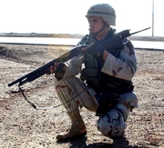 Soldier armed with a shotgun