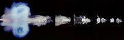  Series of individual 1/1,000,000 second exposures showing shotgun firing shot and expanding cup sabot separation.