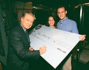 John Carpenter receiving his check for $1,000,000.