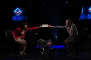 Nguyễn Mai receives a cheque from Lại Văn Sâm