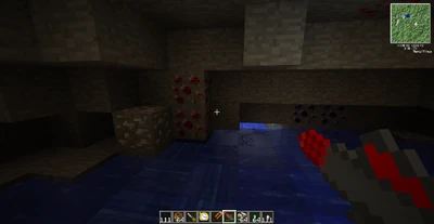 Tekkitin malmeja, esineitä, kuutioita ja työkaluja.