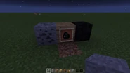 Coal ore, coal on an item frame, and a coal block in Minecraft: Windows 10 Edition Beta.