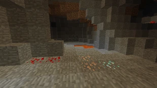 Kuvassa on erilaisia malmeja luolassa, timanttimalmia, punakivimalmia, rautamalimia ja takana hiilimalmia.