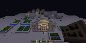 Aavikkotemppeli NPC-kylän keskellä.