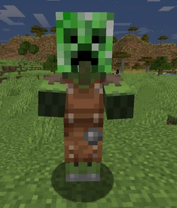 Ein Zombiedorfbewohner trägt einen Creeperkopf