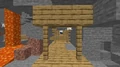 Blick in eine Mine, ein Höhlenspinnen-Spawner ist sichtbar