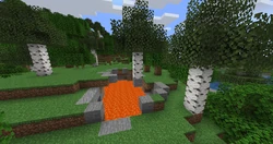 A birch tree that generated on a stone block over a lava pit.