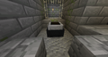 This chest minecart is trapped inside a mossy stone block, due to a stronghold and an abandoned mineshaft generating very close to each other and partially overlapping.