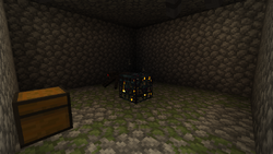 A spider and its monster spawner in a monster room.