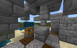 An underwater ruin in Bedrock Edition that generated on land with a water block on top of it.