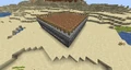 A generic Minecraft Beta Spleef arena, with dirt at the surface and lava beneath inside the pit below.