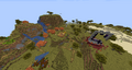 Huge ruined portal next to a savanna village.