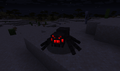 Spiders are one of the most visible mobs at night due to their glowing red eyes.