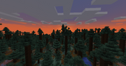 Uma foto de um pôr do sol sobre uma floresta de taiga no Minecraft moderno.