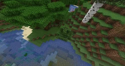 A tree situated on the boundary of a jungle, swamp and desert biome, showing skins of all three on its leaves.