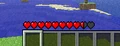 A preview of the health system seen on Notch's blog[3]. Note how the sprite for the half-heart has a thick, black line in the middle.