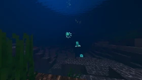 Glow squids swimming in the ocean (Vibrant Visuals enabled)