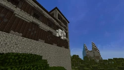 A fossil sticking out of a woodland mansion in the Legacy Console Edition, due to a bug. (notice the texture, MCCE-5216)