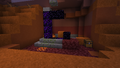 A ruined portal in a badlands biome.