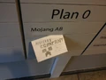Mojang building directory board with a note from some griefers.[43]