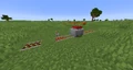 Minecart with TNT and activator rail for detonation.