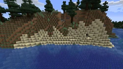 Beach reaching up the hillside.