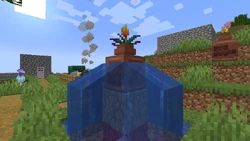 A fountain created with waterlogged decorated pot.