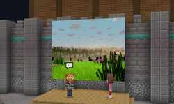 Jeb and Hanah doing a presentation on Minecraft Legends