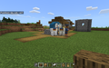 A wandering trader that spawned in a player-made village in Minecraft Education.