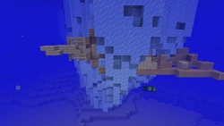A wrecked ship in an iceberg at a frozen ocean.
