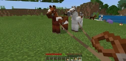 A pair of tamed horses.
