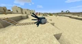 A Squid riding a Minecart.