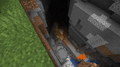 A canyon that exposed a mineshaft.