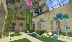 A greenhouse built from yellow sandstone.