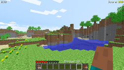 A player with blocks in their inventory, which stack to 99 instead of 64.